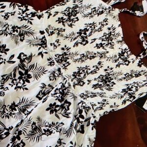 Romper with vibrant floral dress